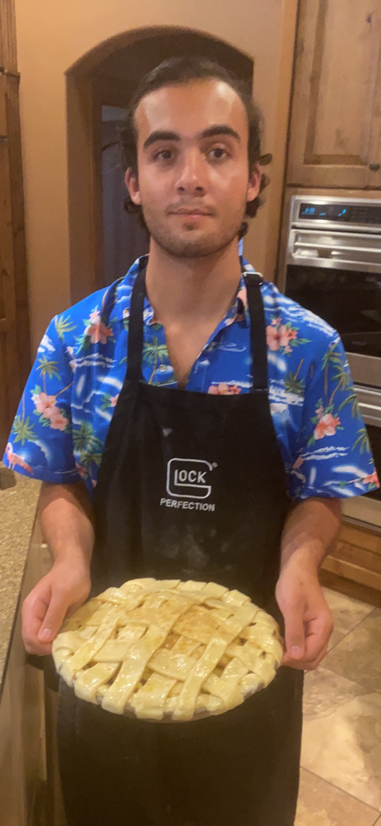 Panagiotis Saliaris and one of his baked creations.